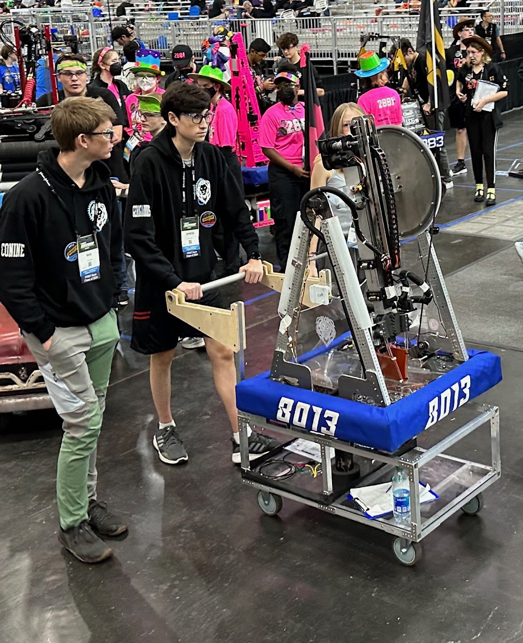 Team 8013 with the robot in the pits